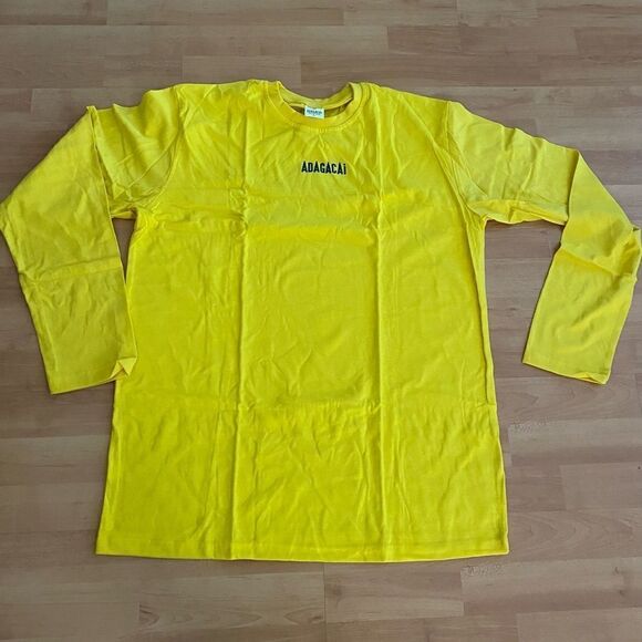 Adagacai Dress Your Passion Long Sleeve Graphic Yellow T Shirt Unisex Sz L NWOT - Picture 1 of 6